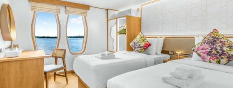 King bed and double bed with big ocean-view windows