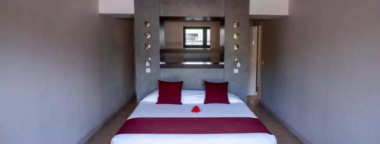 Bedroom interior in a 1 bedroom duplex suite at Te Moana Tahiti Resort