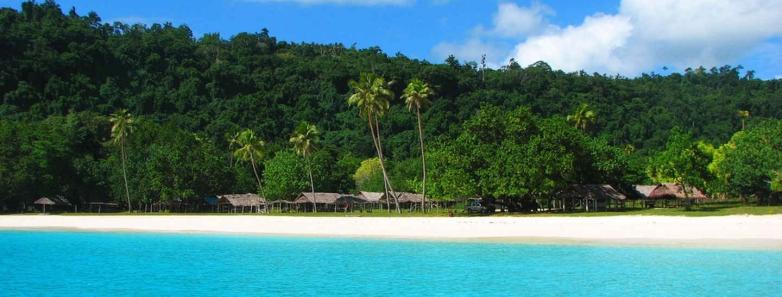 Turquoise seas and white sand beach at The Espiritu Vanuatu.