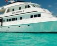 The Belize Aggressor III on clear turquoise water